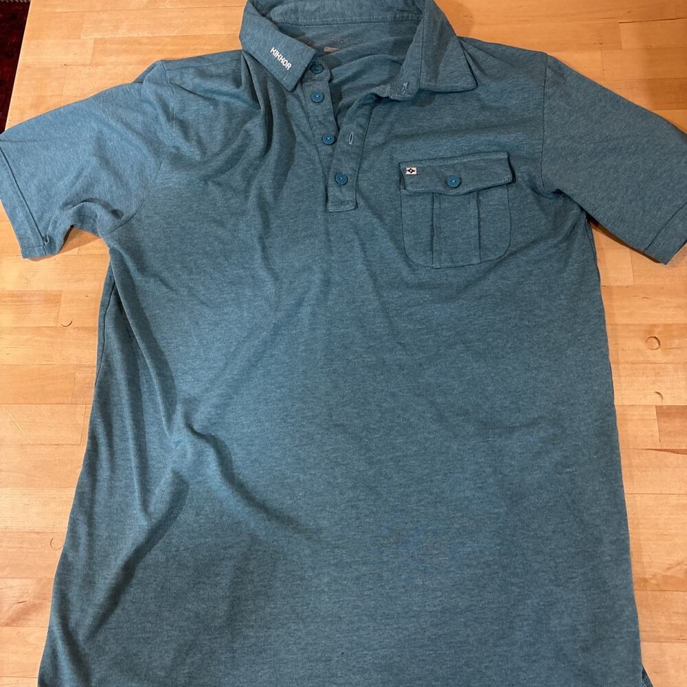 KIKKOR golf polo shirt teal blue heather color featuring a chest pocket Men’s XL